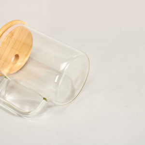 display-of-clear-15oz-sublimation-glass-tumbler-with-handle-and-bamboo-lid