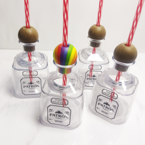 display-of-plastic-patron-bottles-with-straw-wholesale-mini-13oz-wine-cups-with-colorful-cork