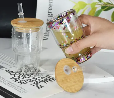 display-of-mini-3oz-sublimation-snow-globe-shot-glasses-with-bamboo-lids